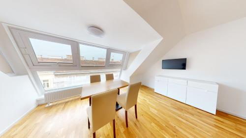 TV a/nebo společenská místnost v ubytování ALON HOMES Vienna - Premium City Center Apartments