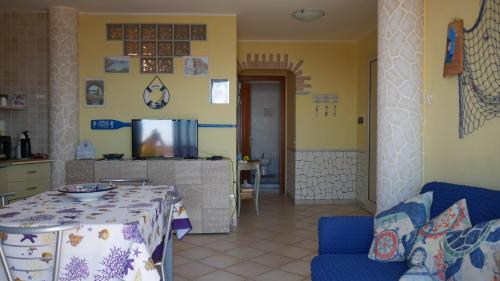 A seating area at Appartamento vista mare Posidonia