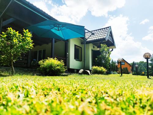 Galeriebild der Unterkunft WczasyMazurskie - Domek całoroczny " Lawenda" Mazury in Mołdzie