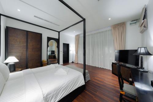 Yao Bada Badoo Boutique Resortにあるベッド