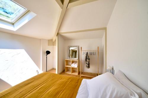 En eller flere senger på et rom på Nid de Ruben, Villa Hostal Naou Hossegor Wifi Netflix Sauna