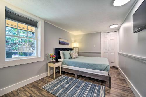 a bedroom with a bed and a window at Multi-Unit Brevard Vacation Rental with Patio! in Brevard