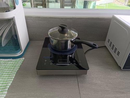 a blender sitting on top of a counter at I Do Farmstay in Bukit Mertajam