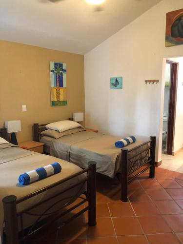 Ένα ή περισσότερα κρεβάτια σε δωμάτιο στο Casa Mi Tesoro
