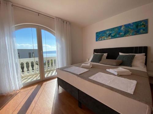Кровать или кровати в номере Villa Mihaela - Apartment Ika