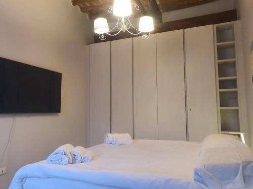 Cama ou camas em um quarto em Mossotti Street Apartment