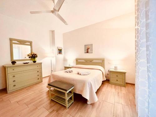 A bed or beds in a room at Casa Clarò