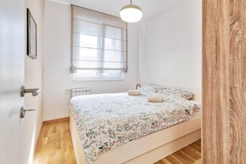 Postel nebo postele na pokoji v ubytování GOLDENBOY apartments, Banja Luka