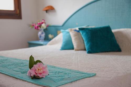 Postel nebo postele na pokoji v ubytování Hotel Micalosu