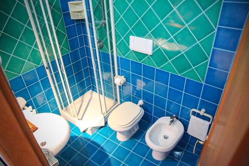 Koupelna v ubytování Hotel Micalosu