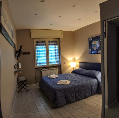 Postel nebo postele na pokoji v ubytování B&B Guest Armonie