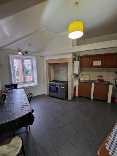 Una cocina o zona de cocina en Alojamento Local Private Accommodation