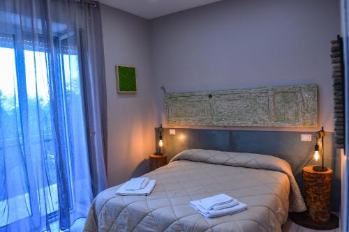 Postel nebo postele na pokoji v ubytování B&B Guest Armonie