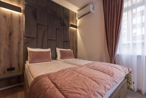 Letto o letti in una camera di Casa ARTEE Free Parking