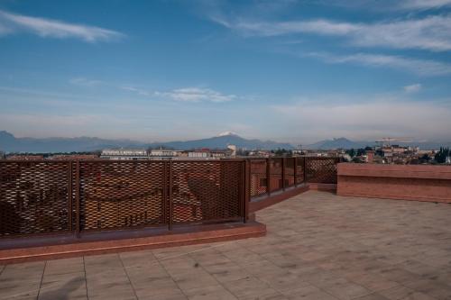 a balcony with a view of a city at K MODERN HOTEL in Peschiera del Garda