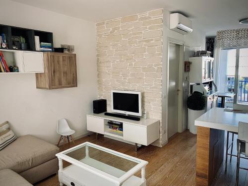 Ein Sitzbereich in der Unterkunft Appartamento incantevole a Misano Adriatico