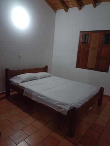 Postel nebo postele na pokoji v ubytování Casa Bautan