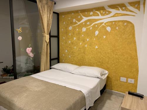מיטה או מיטות בחדר ב-Hostel Casa Zambrano