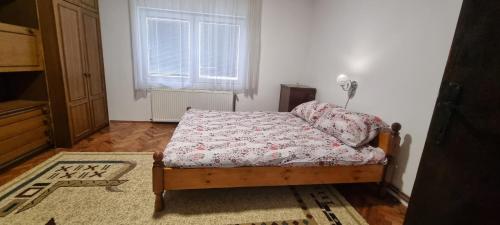 Postel nebo postele na pokoji v ubytování Apartman Sims