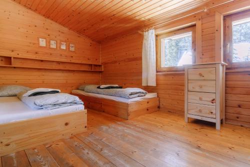 Postel nebo postele na pokoji v ubytování Chata pod Sedlom Čertovica