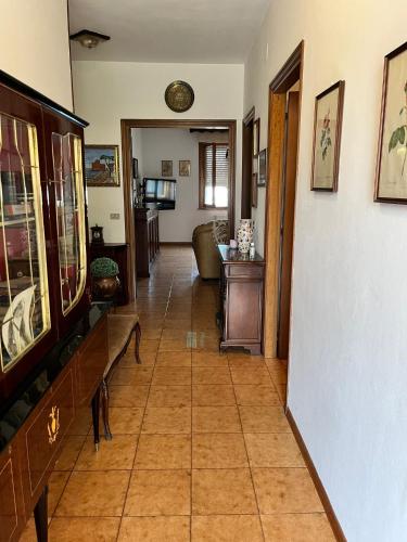 a hallway of a house with a tile floor at Casa Riotorto in Riotorto