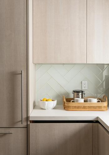 a kitchen with a counter top with a bowl of food at Palm Cottage in Montecito