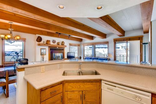 a kitchen with a sink and a counter top at Large 2 Br With Open Floorplan Condo in Crested Butte