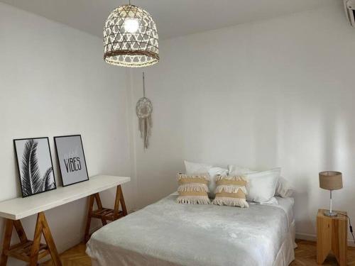 Cama ou camas em um quarto em Bright apartment in Palermo