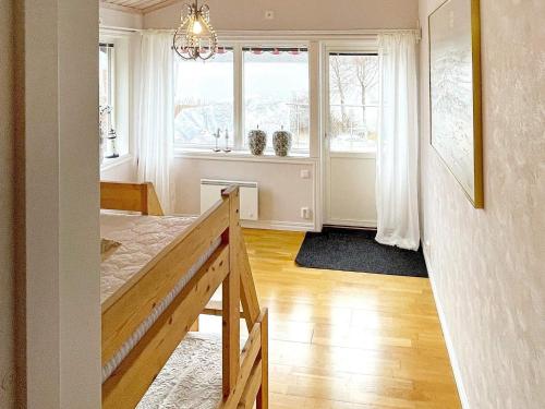 a living room with a table and a window at 8 person holiday home in Uddevalla-By Traum in Uddevalla