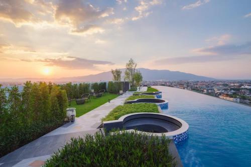 a view of the water from the roof of a building at Astra Sky River Paronama Pool Luxury Changklan Chiang Mai in Chiang Mai
