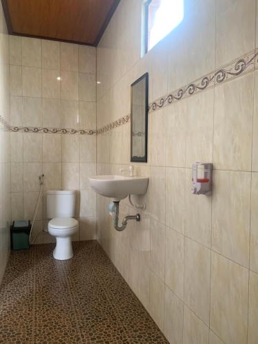 Ένα μπάνιο στο Bima Homestay Lembongan