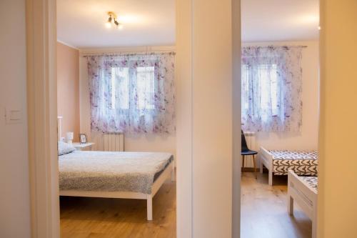 Postel nebo postele na pokoji v ubytování Apartment Fioretti