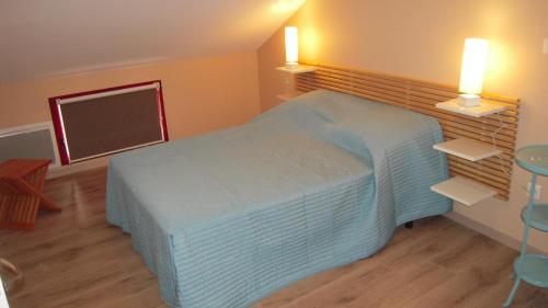 Postel nebo postele na pokoji v ubytování Gite du sechoir