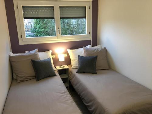 Posteľ alebo postele v izbe v ubytovaní Lilas la vallee des noyers