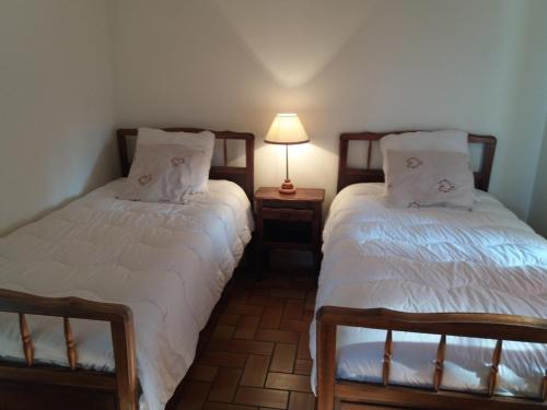 Postel nebo postele na pokoji v ubytování Chateau d'ayron