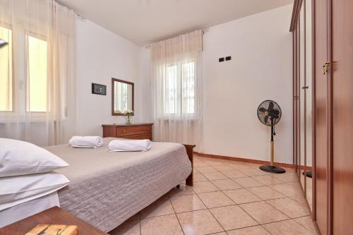 Posteľ alebo postele v izbe v ubytovaní Gionno's apartment