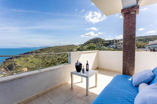 a balcony with a view of the ocean at Appartamenti Rocca 'Ja in Castelsardo
