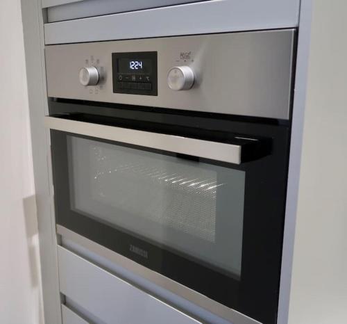 Dapur atau dapur kecil di Stylish Studio Apartment, ensuite, kitchenette