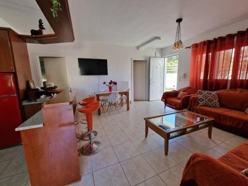 A television and/or entertainment centre at Maria's Apartments