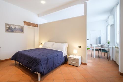 Krevet ili kreveti u jedinici u okviru objekta Residence dell'Abbadia by Studio Vita
