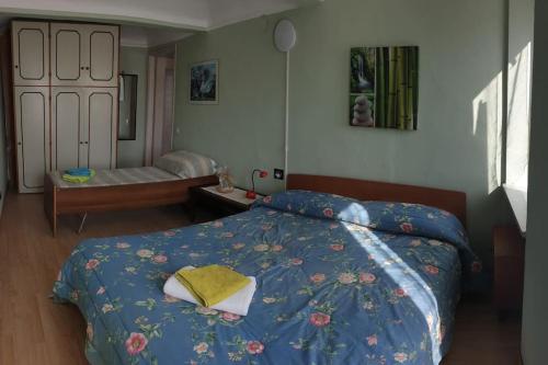 Een bed of bedden in een kamer bij Il nido di Simone