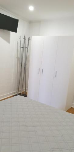 Postel nebo postele na pokoji v ubytování Pátio das Cantigas