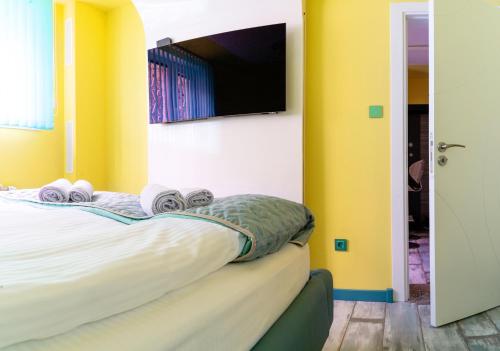 Postel nebo postele na pokoji v ubytování Sofiel cozy apartment - Top Center Sofia