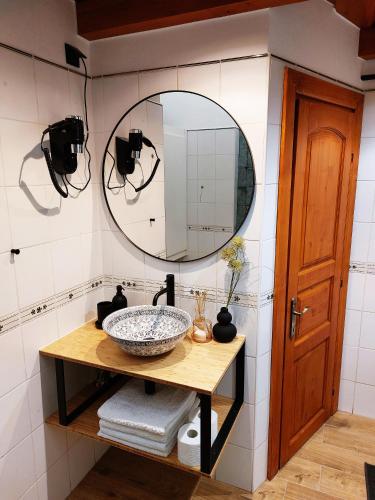 a bathroom with a sink and a mirror at SQUARE 16 - Absolutely Central Location in Szombathely