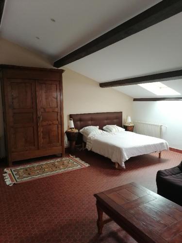 Ένα ή περισσότερα κρεβάτια σε δωμάτιο στο Lou mas suzoun