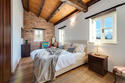 Katil atau katil-katil dalam bilik di Villa Avalon - Luxury home with pool in the centre of Istria