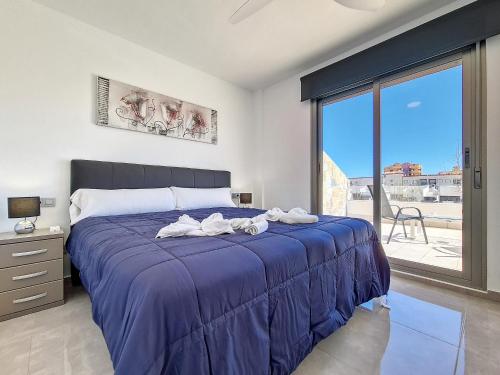 Katil atau katil-katil dalam bilik di Los Alcazares Villa - 9509