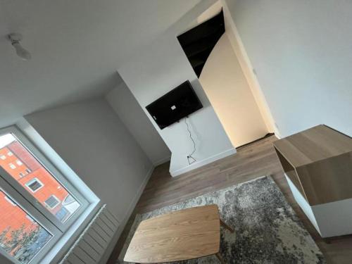 une chambre avec un haut-parleur dans l'établissement Maisonnette Numero 7, à Lille