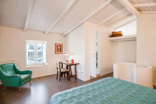 Ένα ή περισσότερα κρεβάτια σε δωμάτιο στο 2 Soru Ortigia Holiday Home - Romantico bilocale