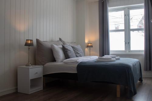 Cama o camas de una habitación en Båtsfjord Brygge - Arctic Resort